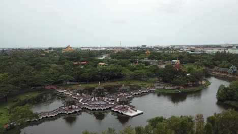 Sala-of-Ramayana-Pavilion-in-Lake-of-Ancient-City-Siam-Park,-Thailand,-Aerial-View
