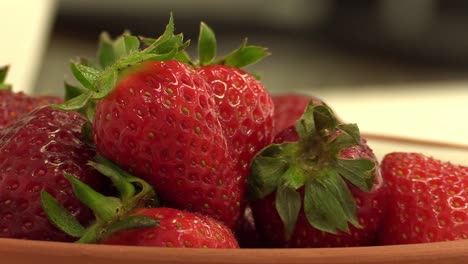 Zooming-Out-Of-a-Bowl-Of-Fresh-Strawberries