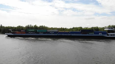Dutch-container-vessel-on-a-river