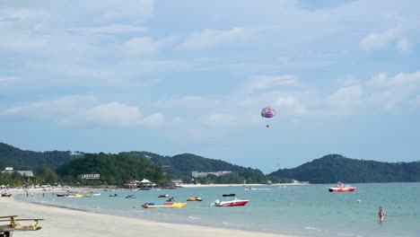 People-have-fun-at-Cenang-Beach-with-Watersport-activities
