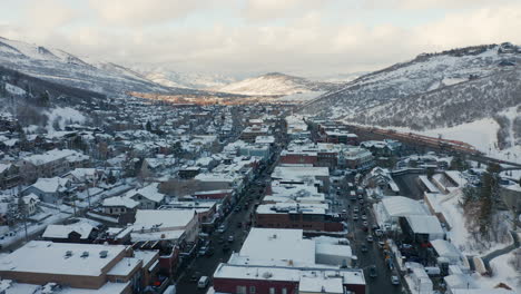 Aerial-Drone-Rise-Up-of-Park-City,-Utah-in-the-winter-during-the-Sundance-Film-Festival