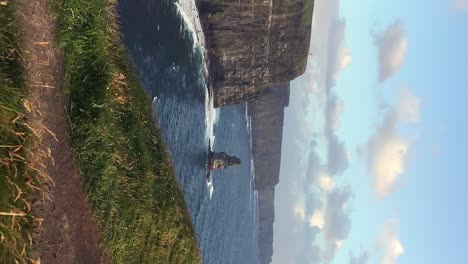 Vertical-video-captures-the-Cliffs-of-Moher-on-a-blustery-sunny-day